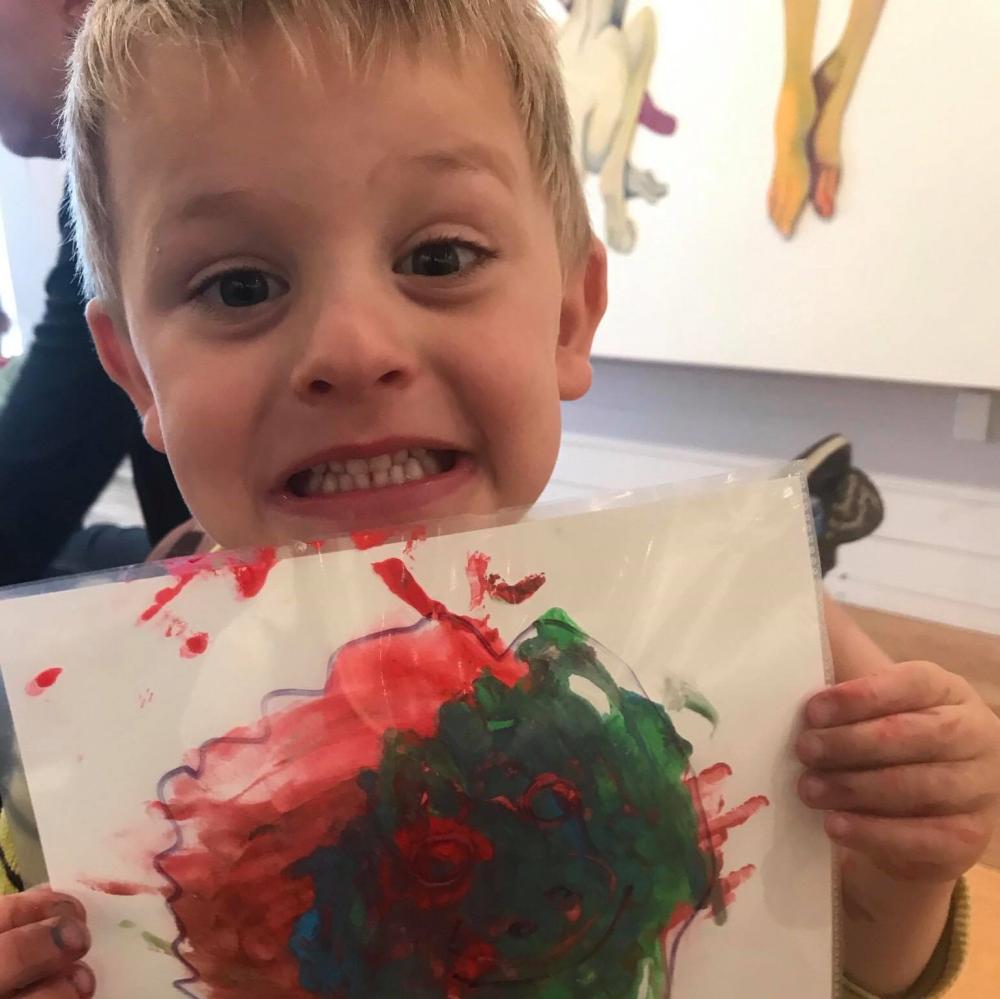 preschooler with artwork