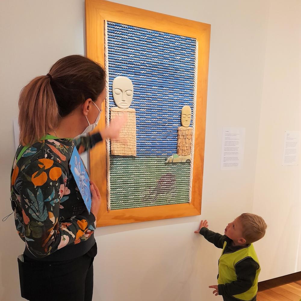 Kate showing a preschooler art