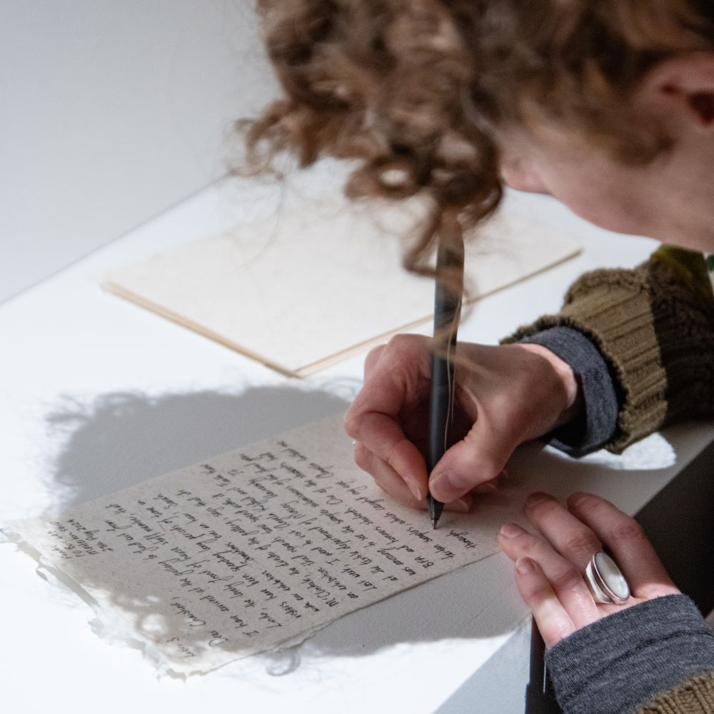 Cat Auburn writing to Christine Borland
