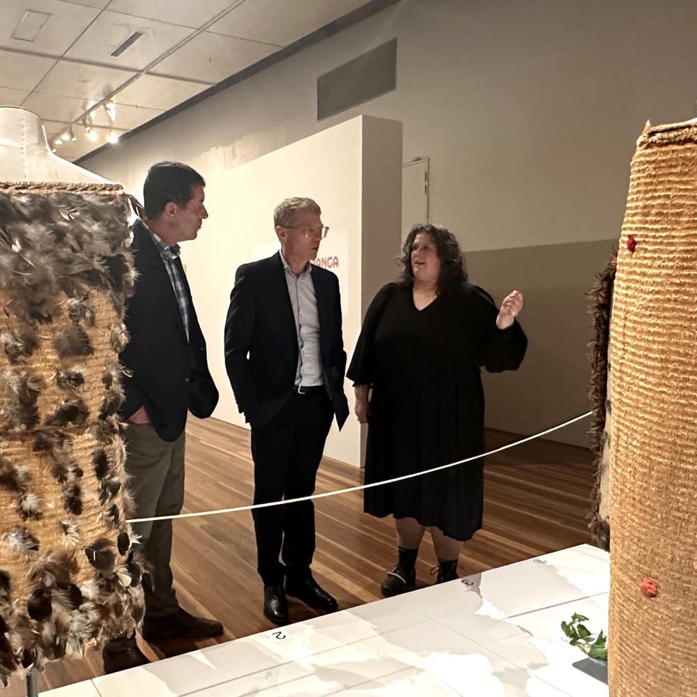 Mike Butterick, Hon Paul Goldsmith and Sarah McCLintock looking at the exhibition Titled Maumahara Raranga: Woven Memories